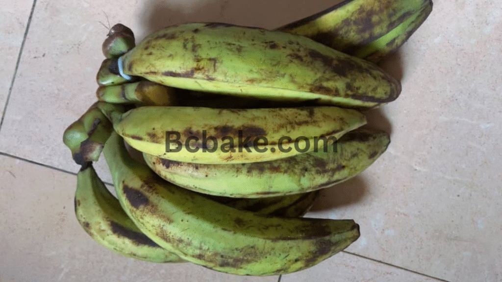 Unripe plantain about to be peeled